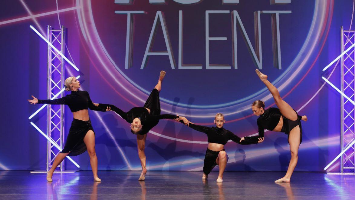 Act 1 Talent dancers performing on stage